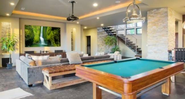 A Recreation Room Located In The Finished Basement Area of A Luxury House. 